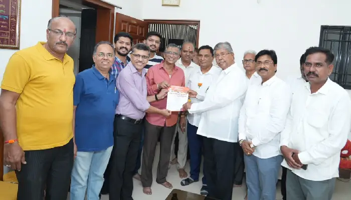 Graduate and Teachers' Constituencies Pune | Chandrakantdada Patil personally reaching out to households to campaign for graduate and teacher candidates; appealing to voters to vote by demonstrating the voting process